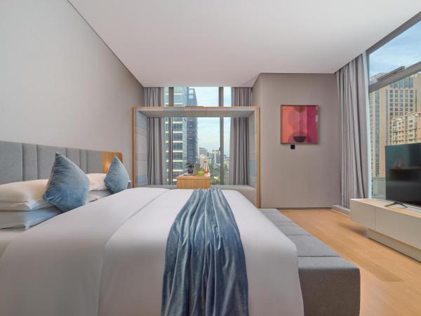 Pagoda Hotel Hangzhou Binjiang : photo 1 de la chambre chambre deluxe (1 adulte + 1 enfant)