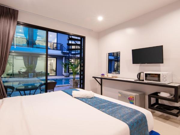 Chanakarn Pool Access Rawai : photo 5 de la chambre chambre double ou lits jumeaux avec accès piscine