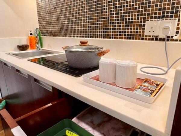 EzraAvenue Homesuites - NEAR IMAGO MALL KOTA KINABALU CITY : photo 10 de la chambre studio avec lit king-size