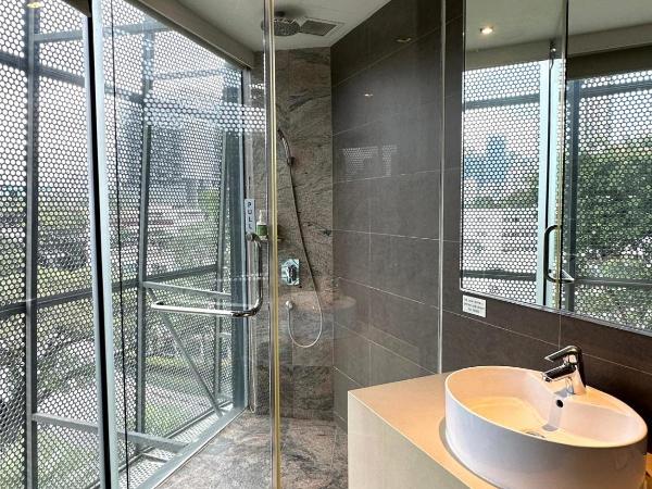 D'Hotel Singapore managed by The Ascott Limited : photo 3 de la chambre chambre lits jumeaux exécutive