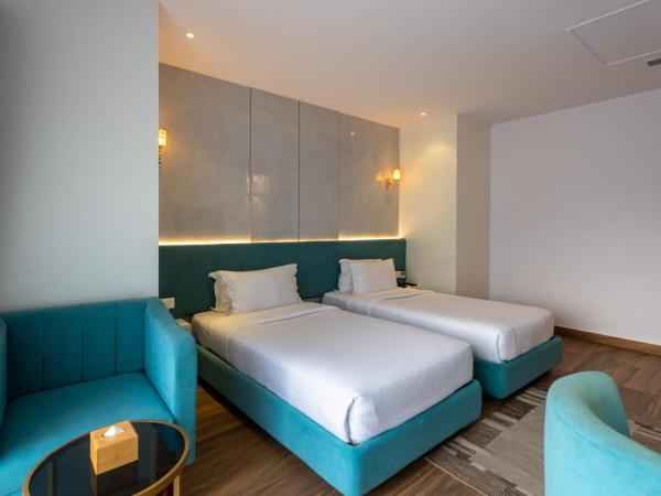 Mount Kailash Resort : photo 1 de la chambre chambre double ou lits jumeaux supérieure avec vue sur ville