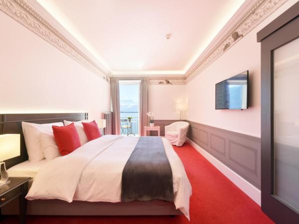 Golf Hotel René Capt : photo 1 de la chambre chambre double ou lits jumeaux supérieure - vue sur lac