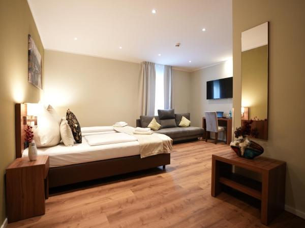Hotel Attaché an der Messe : photo 3 de la chambre superior studio - basement with sofa bed