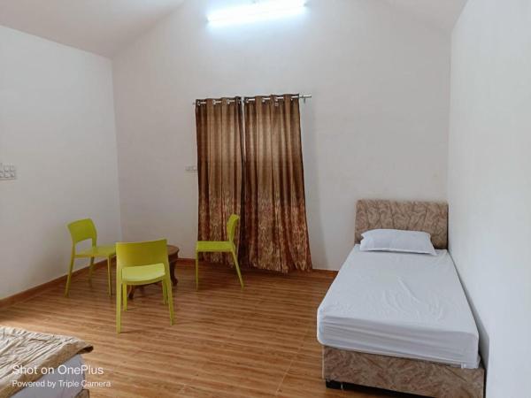 Jamnagar Villas and home : photo 4 de la chambre studio avec vue sur jardin