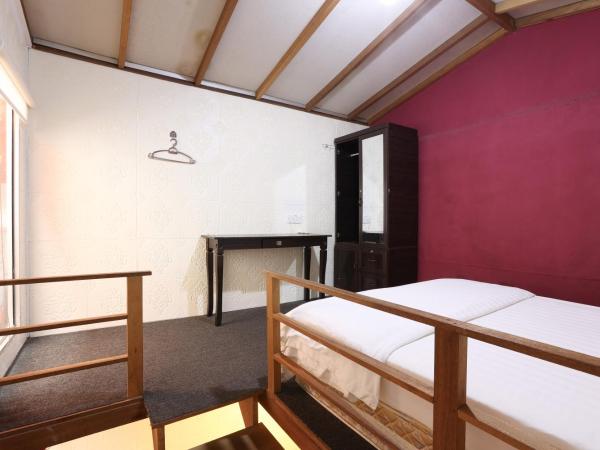 Dou Houz Georgetown : photo 7 de la chambre chambre quadruple avec salle de bains