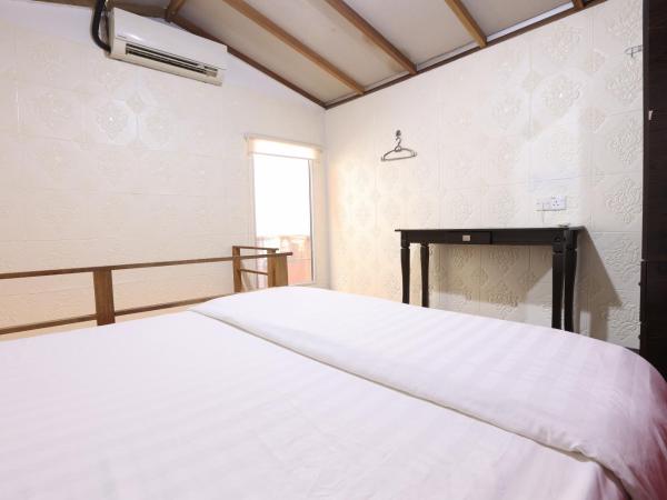 Dou Houz Georgetown : photo 6 de la chambre chambre quadruple avec salle de bains