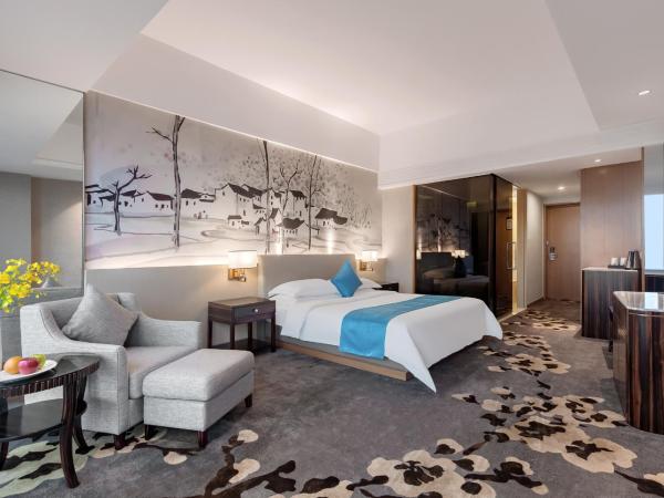 Huaqiang Plaza Hotel Shenzhen, Enjoy Complimentary Afternoon Tea & Mini Bar & Night Snack : photo 3 de la chambre forfait chambre double de luxe