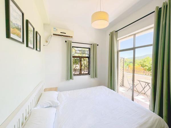 Cloud Tree Inn Yun Shu Li ,Xichong, Shenzhen : photo 1 de la chambre chambre double avec balcon