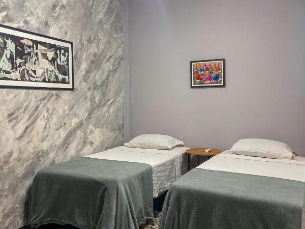 Éden Pampulha - Hotel Coworking : photo 1 de la chambre chambre double avec salle de bains commune