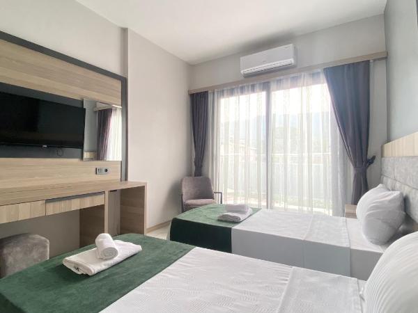 Medos Hotel : photo 4 de la chambre suite familiale