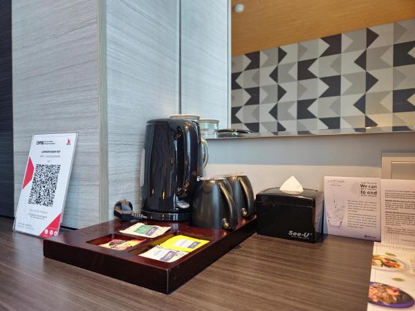 Luminor Hotel Jemursari By WH : photo 8 de la chambre chambre deluxe double ou lits jumeaux