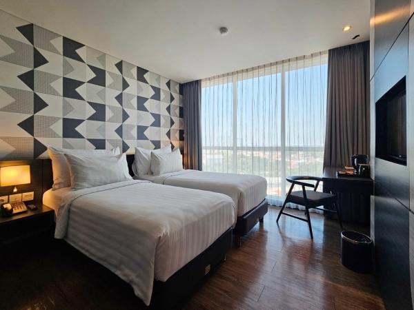 Luminor Hotel Jemursari By WH : photo 6 de la chambre chambre deluxe double ou lits jumeaux