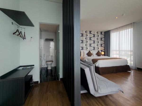 Luminor Hotel Jemursari By WH : photo 6 de la chambre chambre exécutive