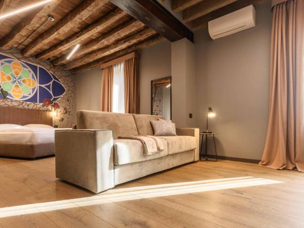 AR Suites&Art : photo 8 de la chambre studio lit king-size avec canapé-lit