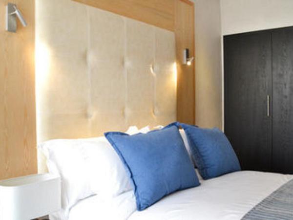 Le 135 appart hotel : photo 2 de la chambre chambre double