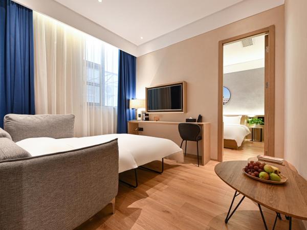 Sincer Hotel - Temple of Heaven Beijing Tiananmen Square : photo 2 de la chambre suite