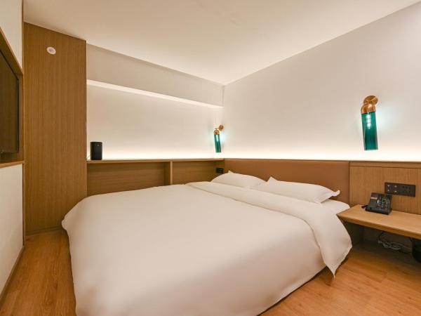 Sincer Hotel - Temple of Heaven Beijing Tiananmen Square : photo 2 de la chambre maisonnette