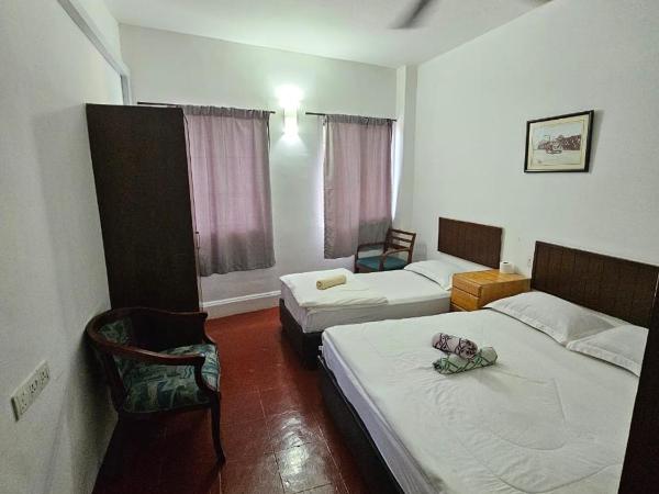 Little India Heritage Villa : photo 1 de la chambre chambre triple avec salle de bains