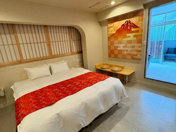 Hotel Be-zen shimanouchi : photo 1 de la chambre chambre lit queen-size avec baignoire spa