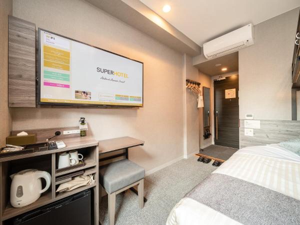 Super Hotel Premier Nagoya Sakuradoriguchi : photo 4 de la chambre chambre avec lit double et lits superposés