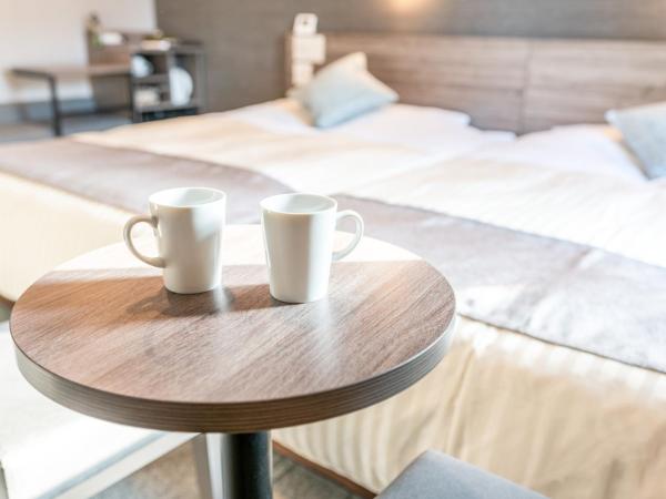 Super Hotel Premier Nagoya Sakuradoriguchi : photo 3 de la chambre chambre lits jumeaux