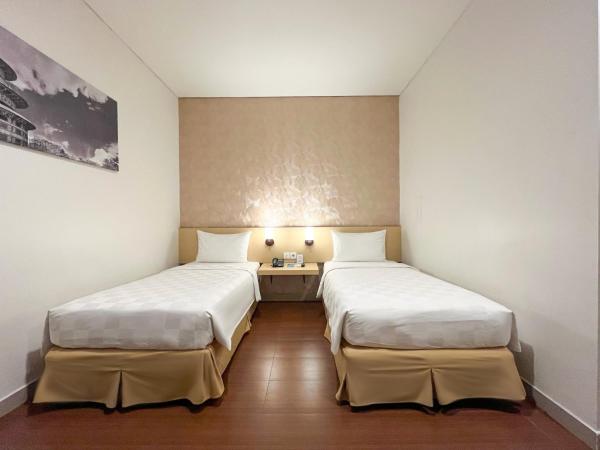 Hotel 88 Embong Malang Surabaya By WH : photo 2 de la chambre chambre lits jumeaux supérieure
