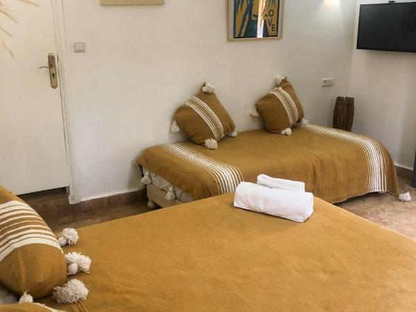 Vent Des Dunes : photo 2 de la chambre chambre triple avec terrasse