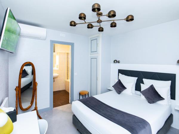 HOTEL DE PARIS MONTPARNASSE : photo 2 de la chambre suite familiale avec balcon