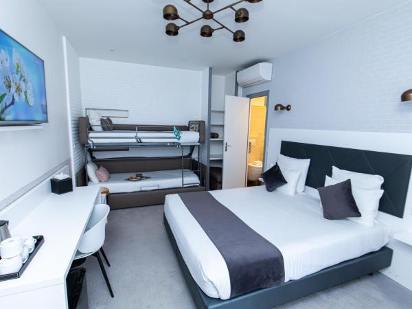 HOTEL DE PARIS MONTPARNASSE : photo 1 de la chambre suite familiale avec balcon