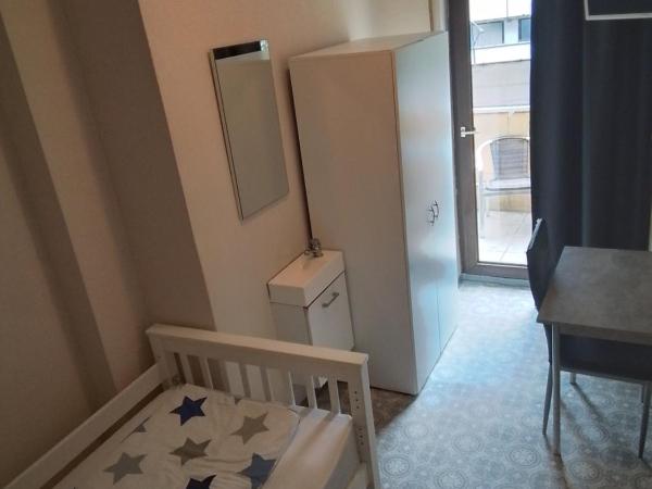 MB City Pension : photo 1 de la chambre chambre simple avec balcon