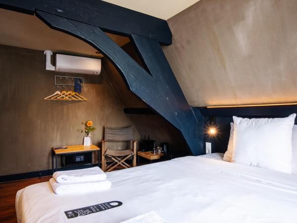 City Center Lodge Utrecht : photo 6 de la chambre chambre lit queen-size