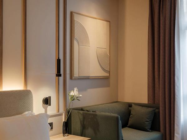 H10 Puerta de Alcalá : photo 6 de la chambre chambre supérieure familiale (3 adultes)