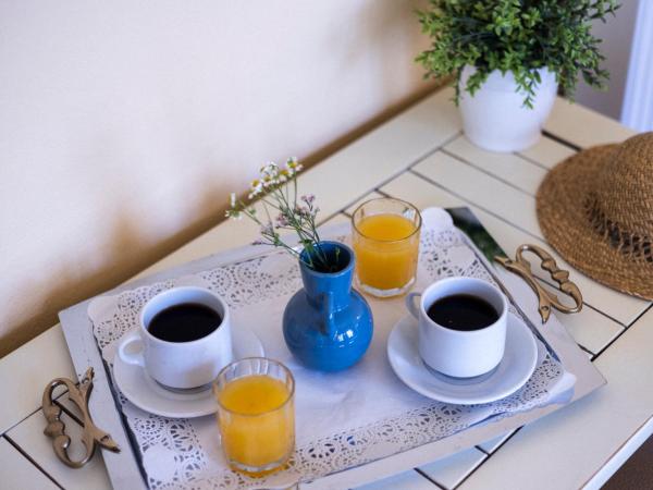 Sundial Lodge : photo 7 de la chambre chambre quadruple - vue sur jardin