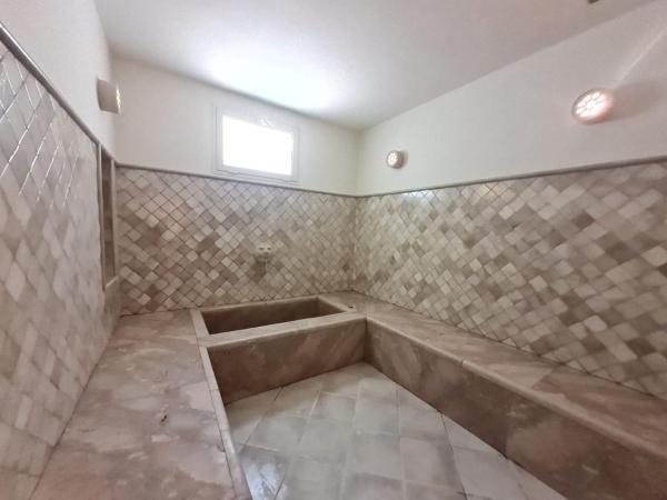 Villa Tunisienne : photo 4 de la chambre chambre lit queen-size avec balcon