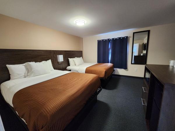 Falls Lodge & Suites : photo 2 de la chambre chambre familiale