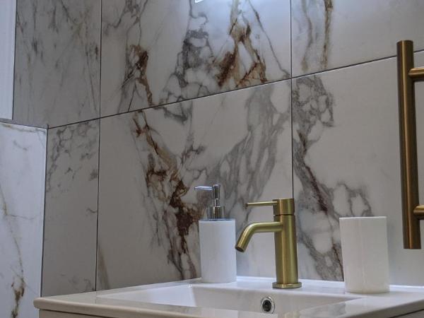 Relax Inn Guest House : photo 7 de la chambre chambre triple deluxe