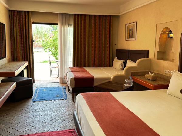 Palais Riad Berbère : photo 3 de la chambre chambre triple - vue sur jardin