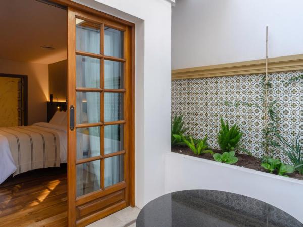 El Bodeguero Hotel : photo 4 de la chambre chambre double deluxe avec balcon