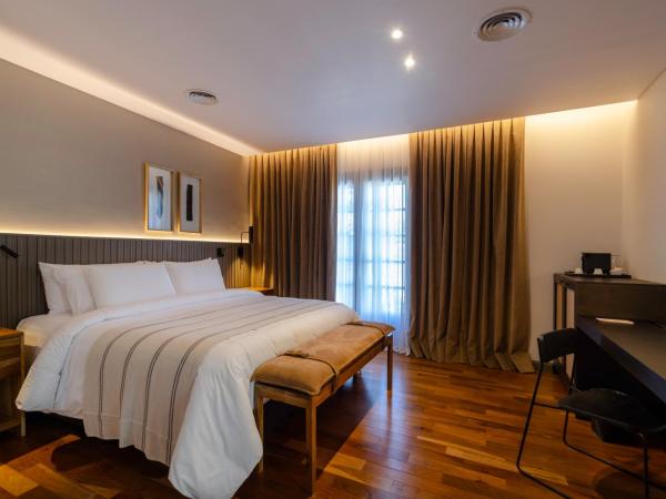 El Bodeguero Hotel : photo 1 de la chambre chambre double deluxe avec balcon