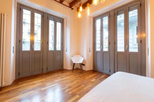 Milanohome : photo 4 de la chambre chambre double standard avec salle de bains commune