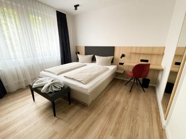 HOLI City Apart Hotel Berlin : photo 4 de la chambre chambre double avec salle de bains privative
