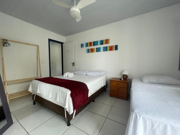 Brothers Suites Centro Búzios : photo 10 de la chambre chambre triple avec balcon