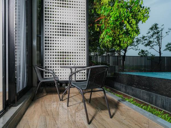 SureStay by Best Western Bangkok Ramintra : photo 5 de la chambre deluxe two-bedroom suite with one queen bed and two single beds - duplex/poolside