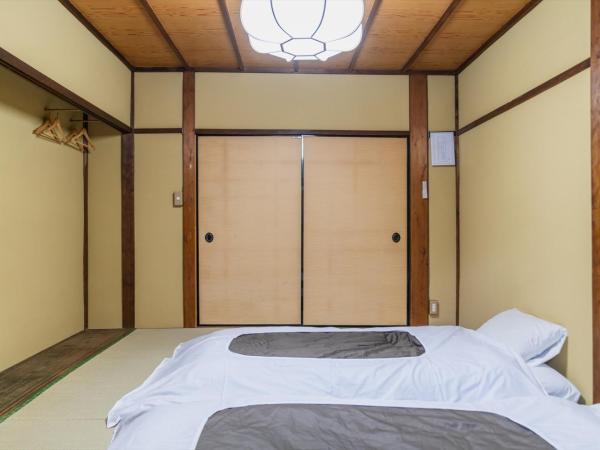 Guest House Hitsujian : photo 6 de la chambre chambre lits jumeaux - vue sur jardin