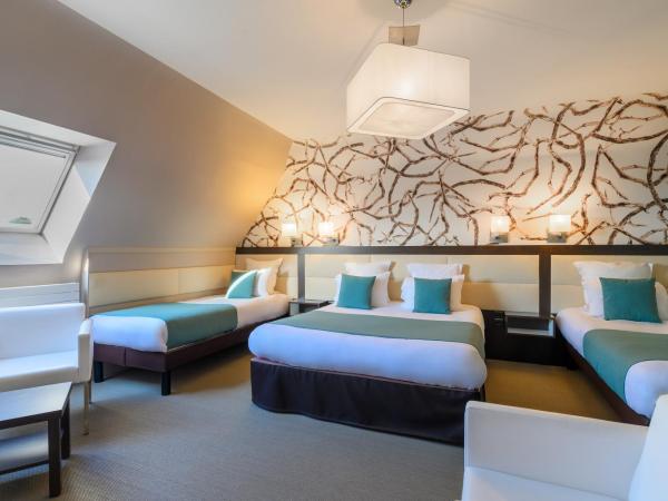 Quality Hotel La Marebaudière Vannes Centre : photo 1 de la chambre chambre quadruple