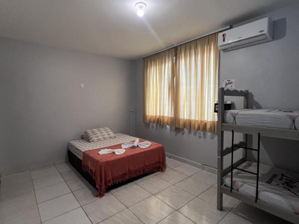 Salve Maloca Hostel : photo 2 de la chambre chambre familiale avec salle de bains privative