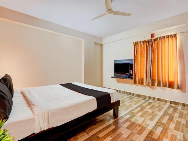 Hotel O PMR Hotel : photo 4 de la chambre chambre triple classique