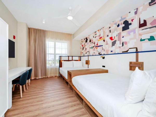 Embassy Suites By Hilton Orlando Sunset Walk : photo 4 de la chambre two-bedroom king suite with two queen beds and balcony