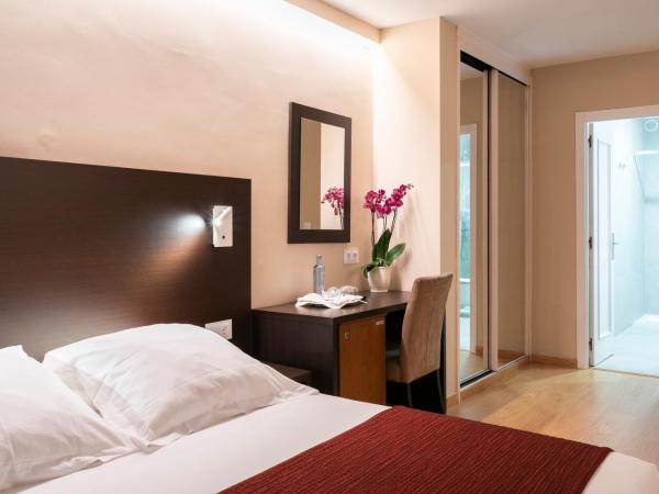 Hotel Santiago Apóstol : photo 4 de la chambre chambre double ou lits jumeaux