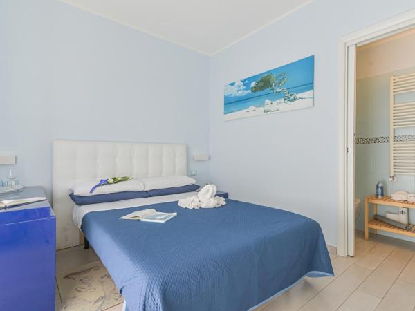 LINUS B&B by BREATHE LIGURIA : photo 9 de la chambre chambre quadruple premium